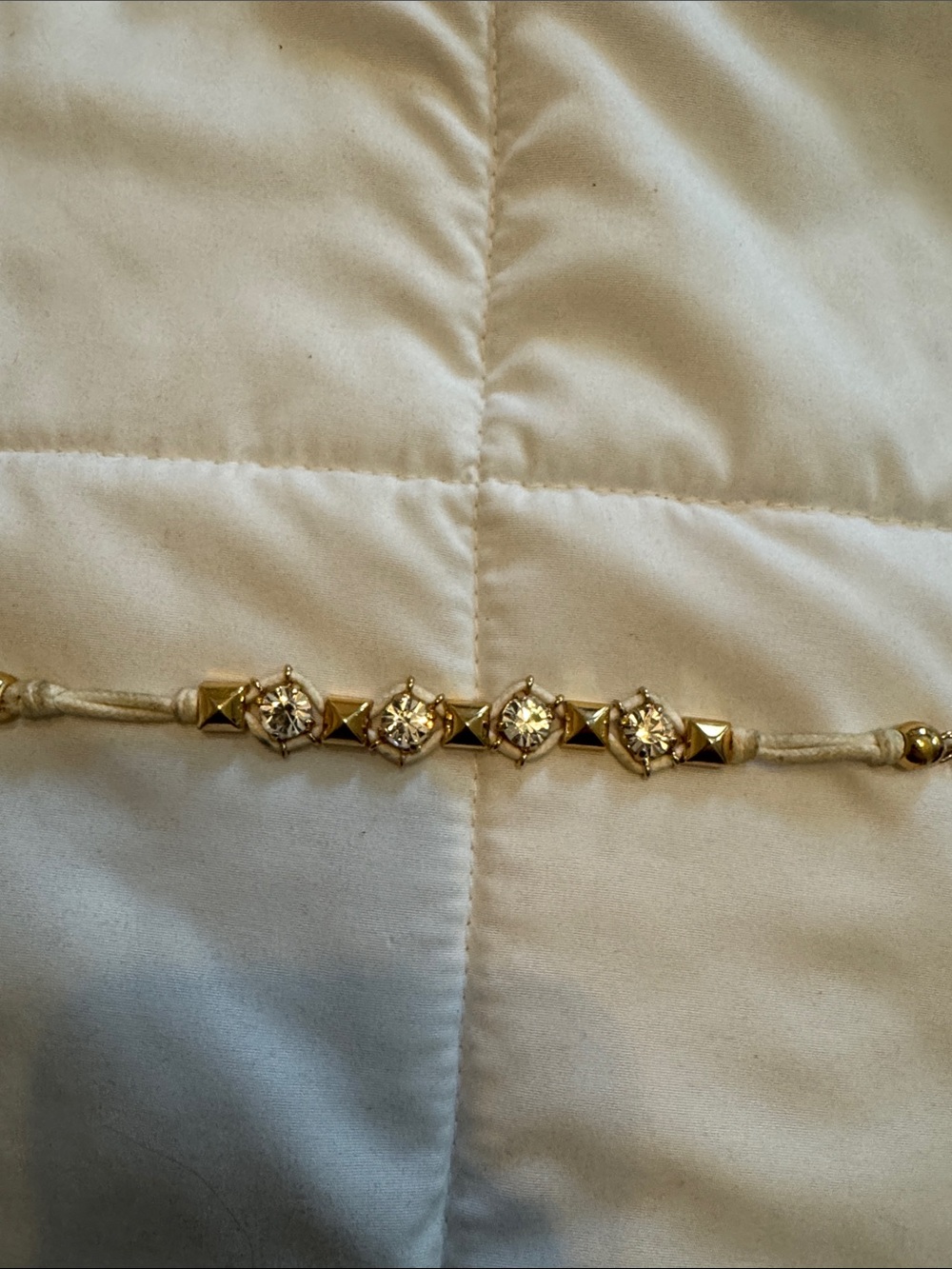 Juicy Couture Gold-Tone Crystal Cord Bracelet in Cream